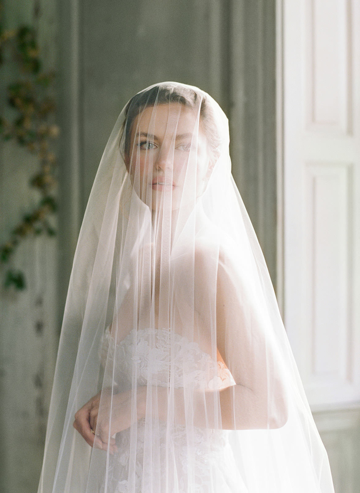 Bride with Viel over her face in portrait